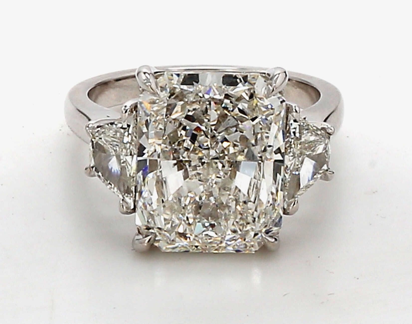 Radiant White Gold Three Stone Engagement Ring